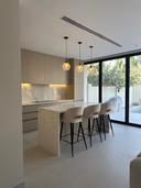 Arco bar stools shown as a set of two