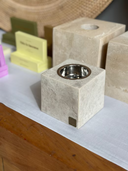 Close-up of the travertine bakhoor burner showing natural stone texture