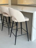 Side view of the Arco bar stool metal frame