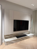 Ajax Greek marble media wall with natural grey veining in a modern living room