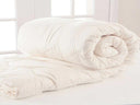 Kouchini Organic Light Wool Duvet — available at Sand & Stone, Dubai